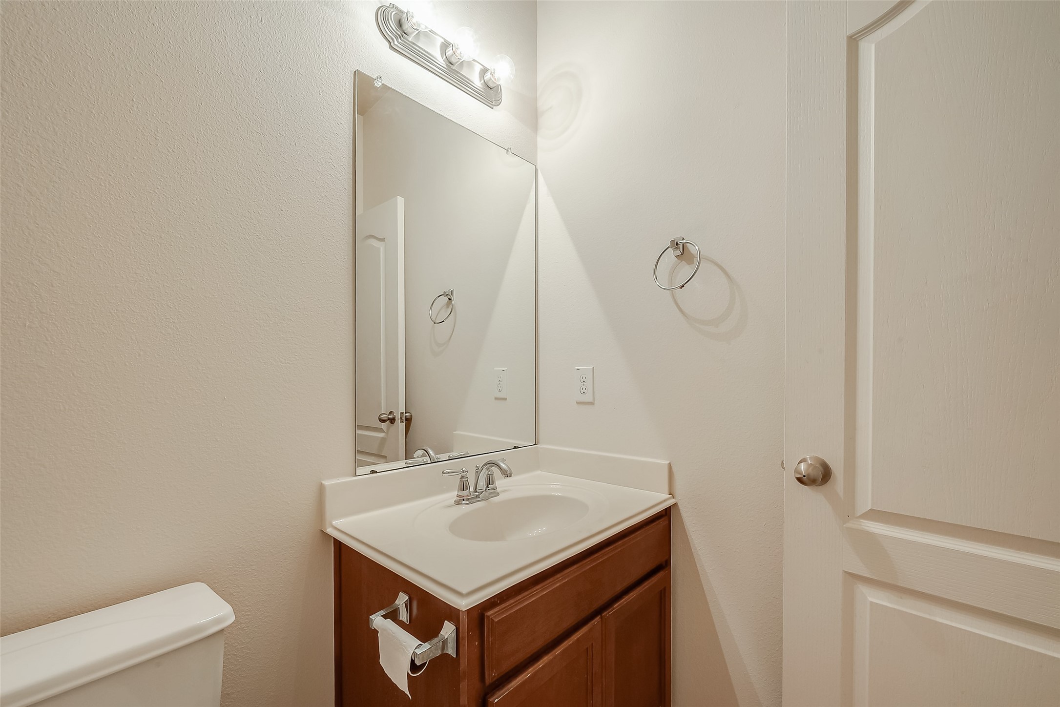 21203 Branchport Drive Houston, TX 77095 - Photo 35 of 49 a bathroom with a sink vanity and a mirror