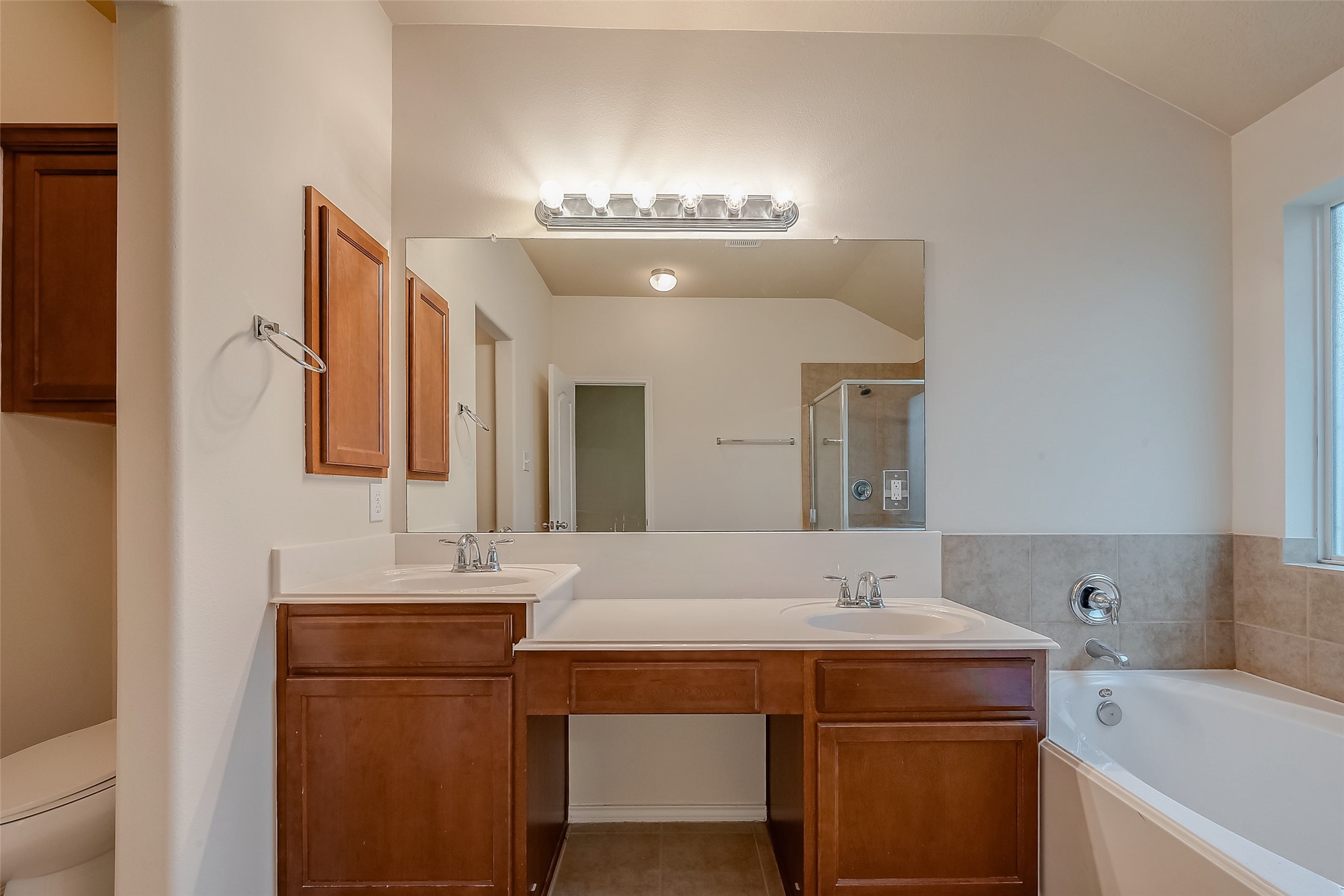 21203 Branchport Drive Houston, TX 77095 - Photo 41 of 49 a bathroom with a sink and a mirror