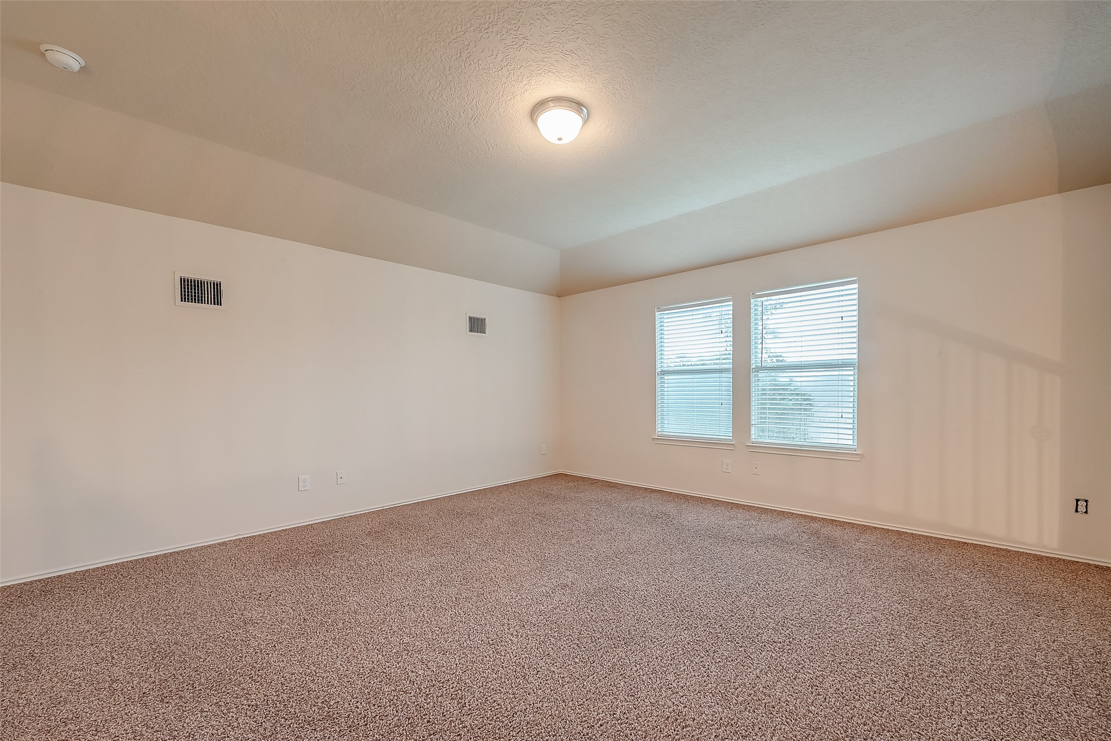 21203 Branchport Drive Houston, TX 77095 - Photo 45 of 49 an empty room with a empty space and windows