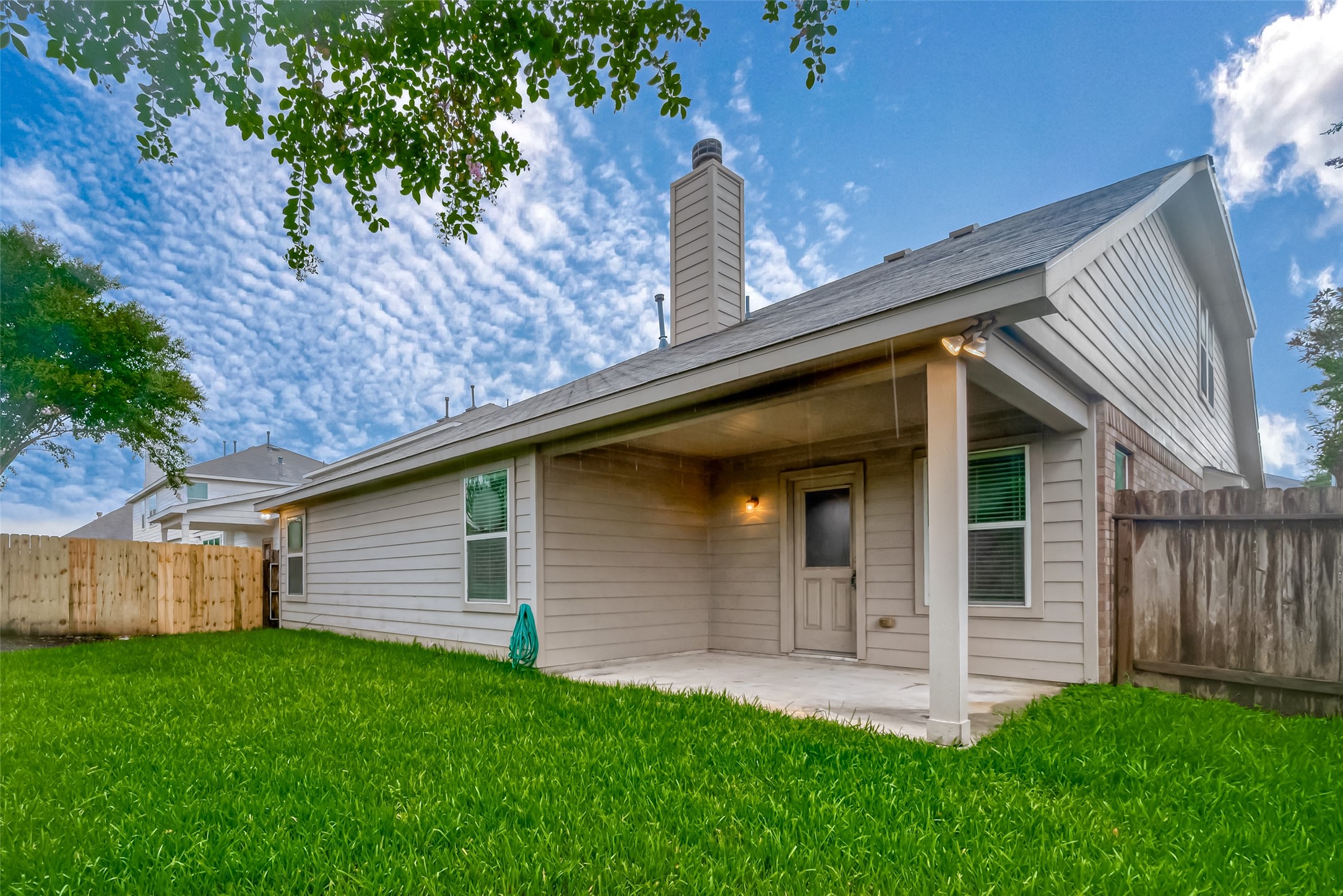 21203 Branchport Drive Houston, TX 77095 - Photo 48 of 49 a backyard of a house with lots of green space