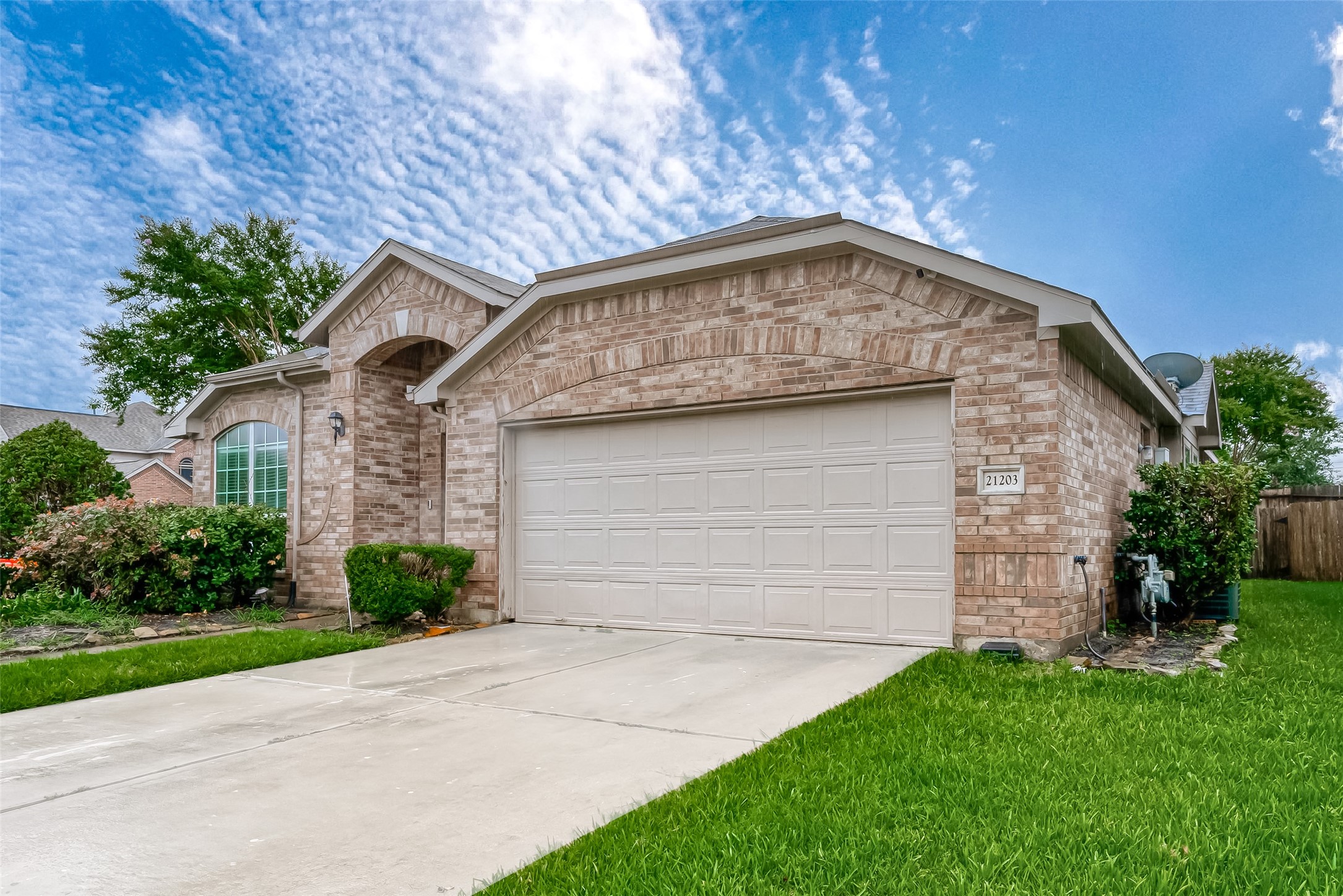 21203 Branchport Drive Houston, TX 77095 - Photo 5 of 49 a view of a house with a small yard
