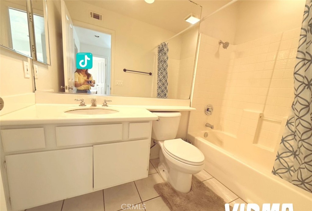 8 Marsala Irvine, CA 92606 - Photo 4 of 11 a bathroom with a sink toilet vanity and shower