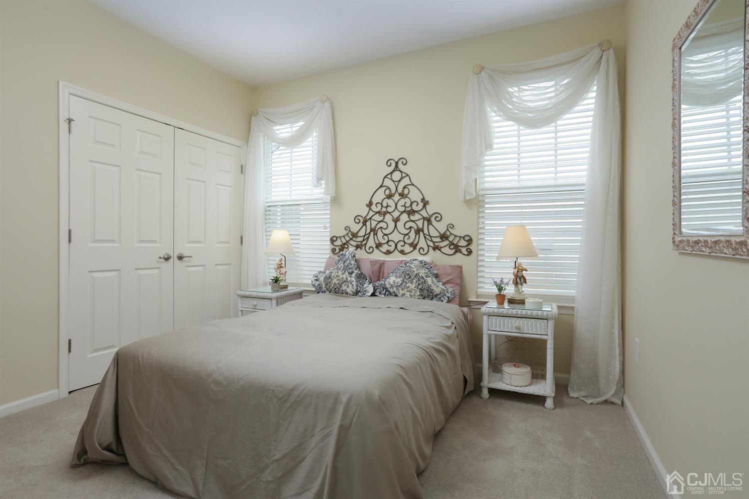 28 Harvest Ridge Road Howell, NJ 07731 - Photo 16 of 27 The second bedroom has a large double closet and lots of light.