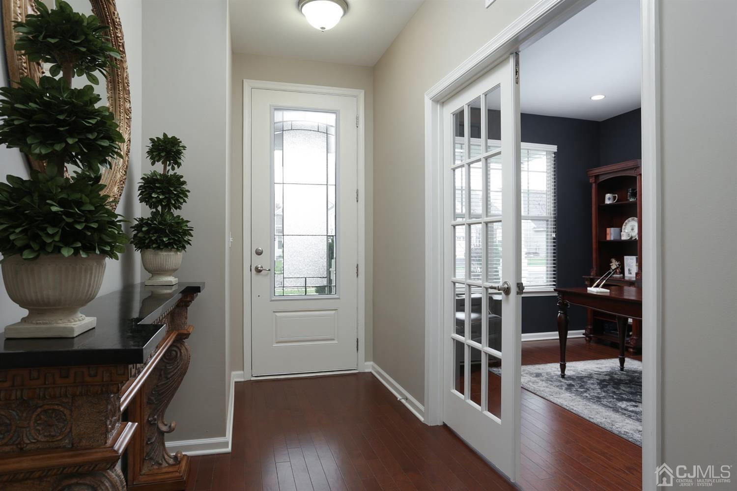 28 Harvest Ridge Road Howell, NJ 07731 - Photo 3 of 27 The entrance foyer has hardwood floors and beautiful 8" tall leaded glass door.