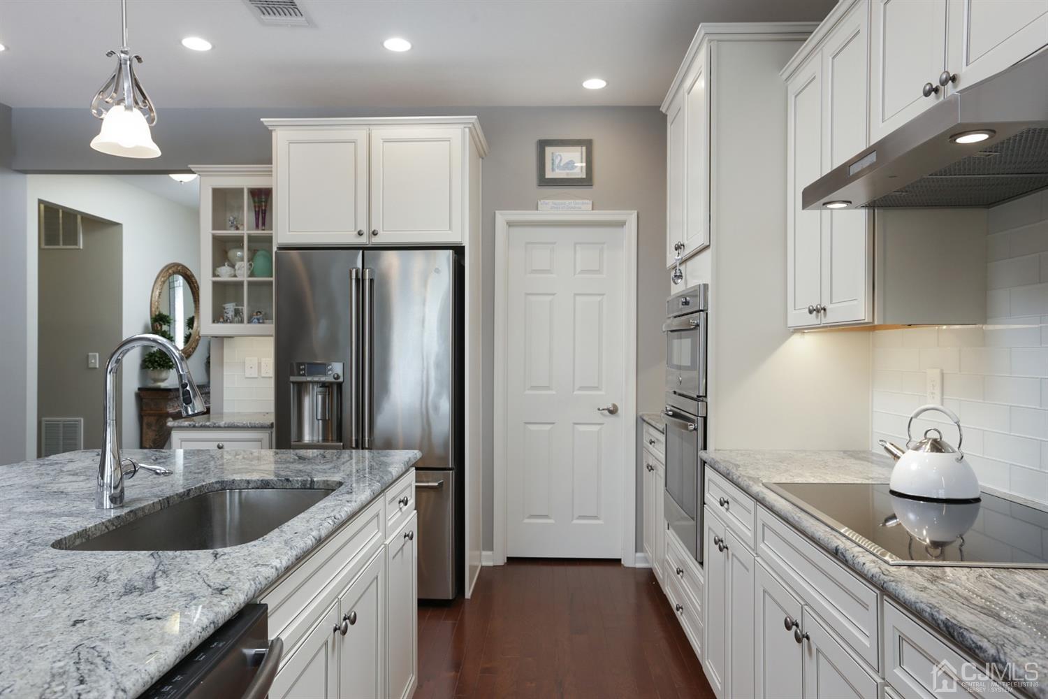 28 Harvest Ridge Road Howell, NJ 07731 - Photo 10 of 27 There is also a walk-in pantry off the kitchen.