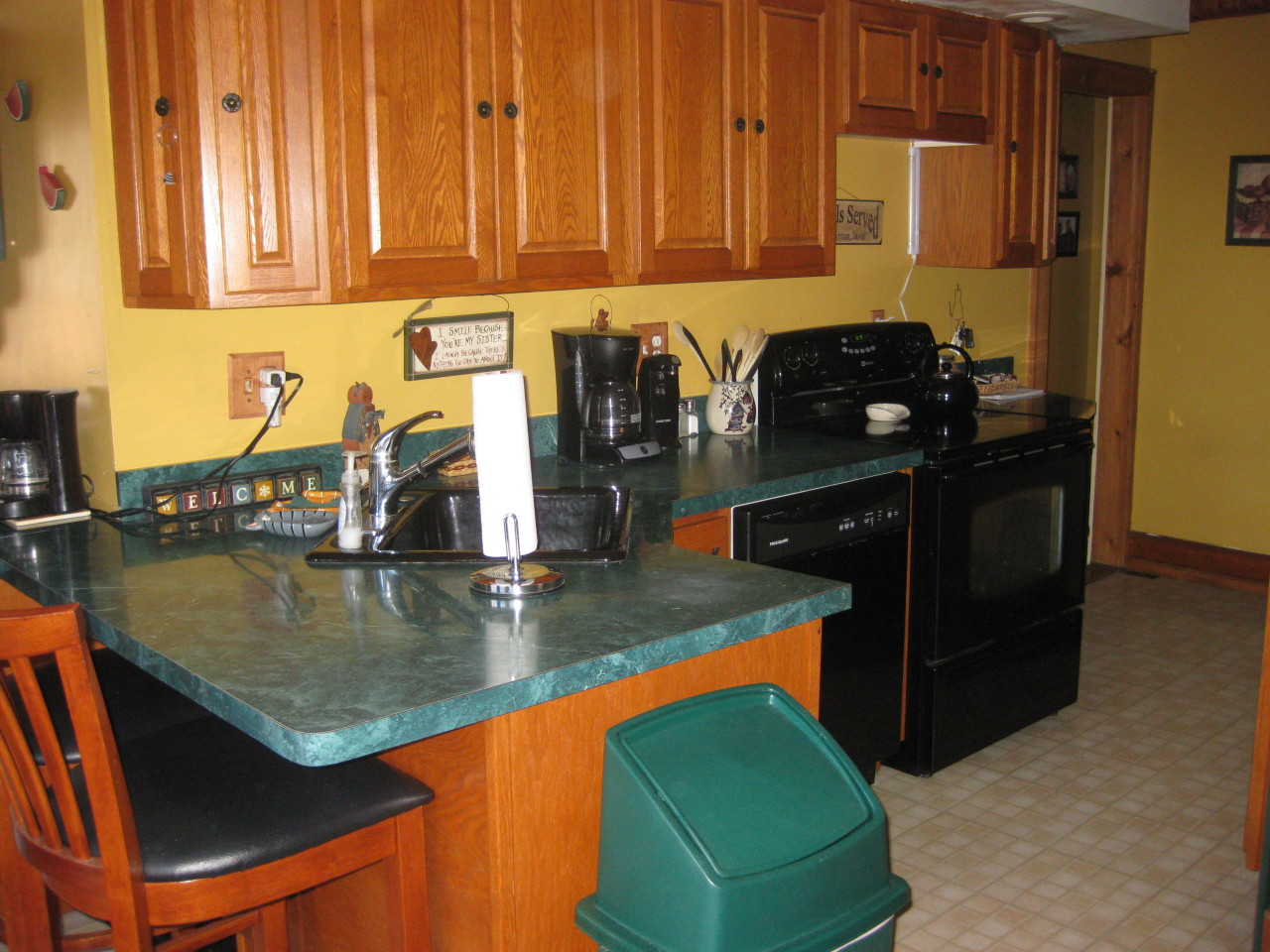 121 Prospect Street Chester, MA 01011 - Photo 7 of 16 a view of a kitchen with a sink and cabinets
