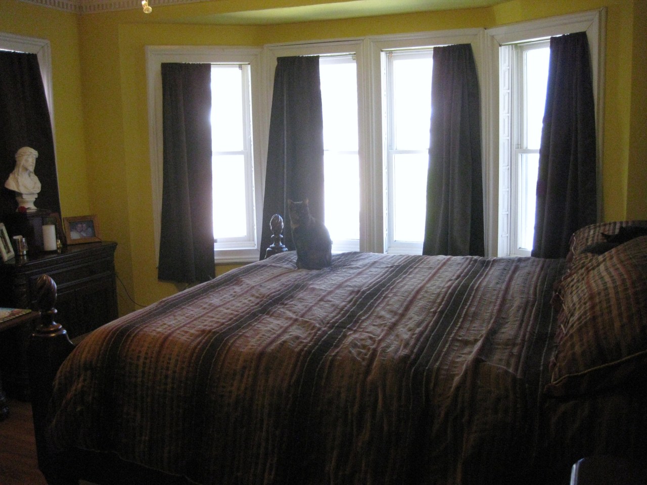 121 Prospect Street Chester, MA 01011 - Photo 9 of 16 a bedroom with a bed and a window