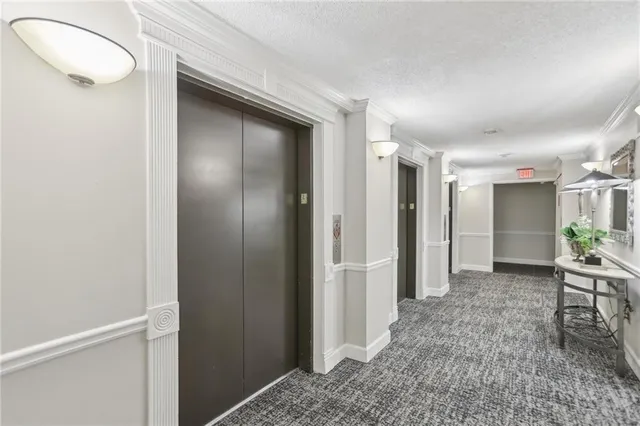 a view of a hallway with closet