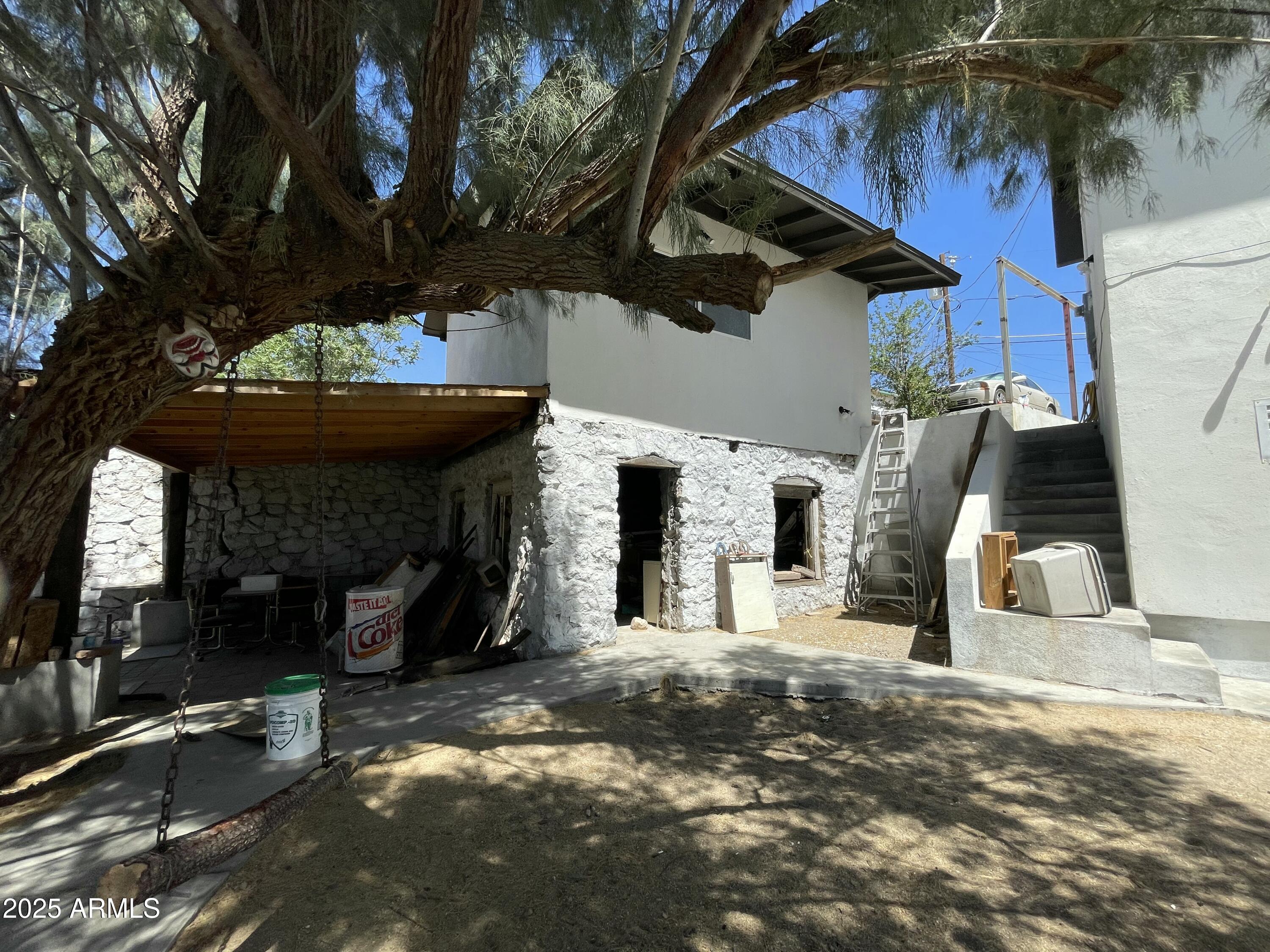 168 Cedar Avenue Miami, AZ 85539 - Photo 7 of 10 a view of a backyard