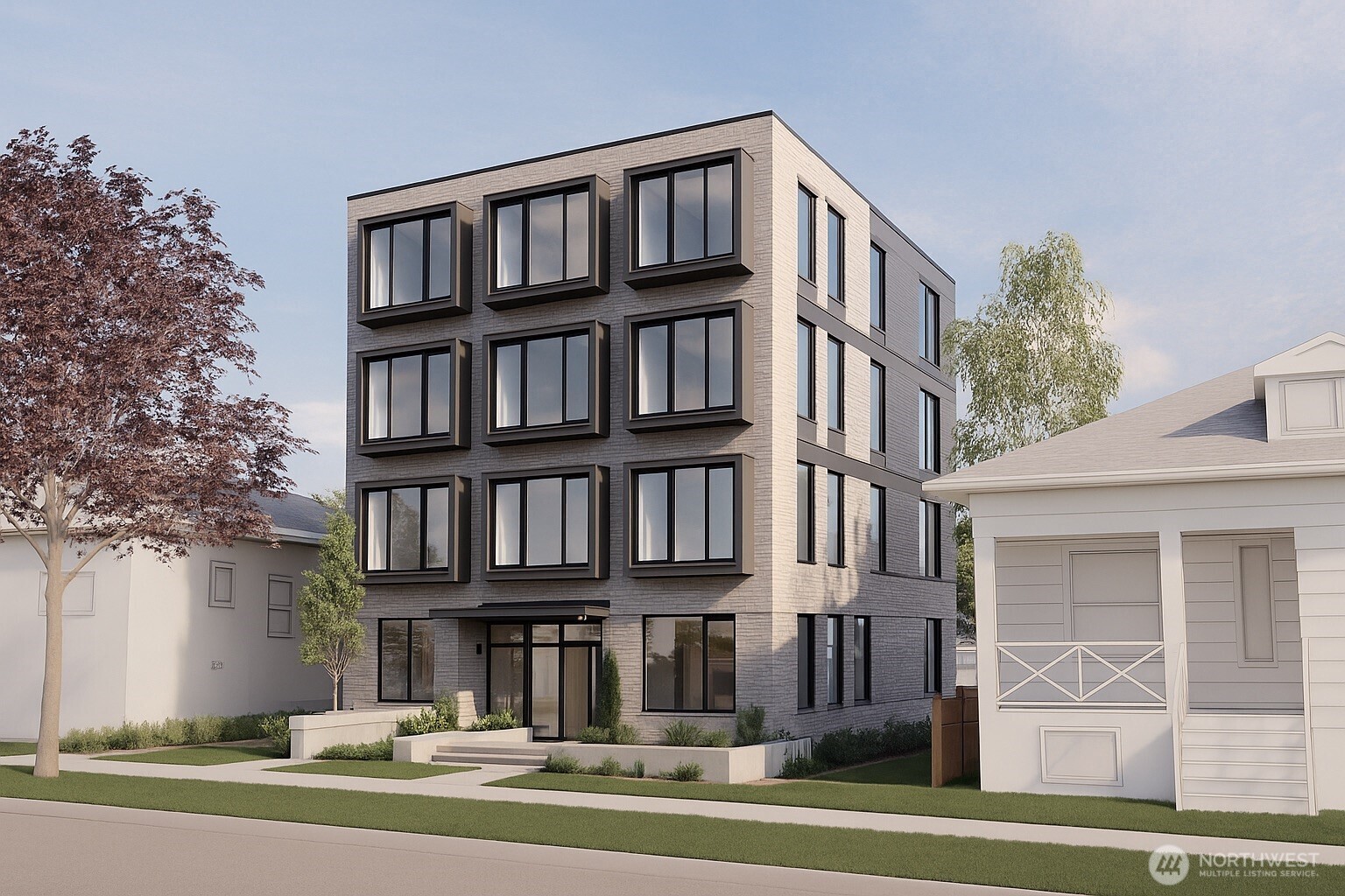 927 Northwest 57th Street Seattle, WA 98107 - Photo 2 of 12 a view of a brick building next to a yard