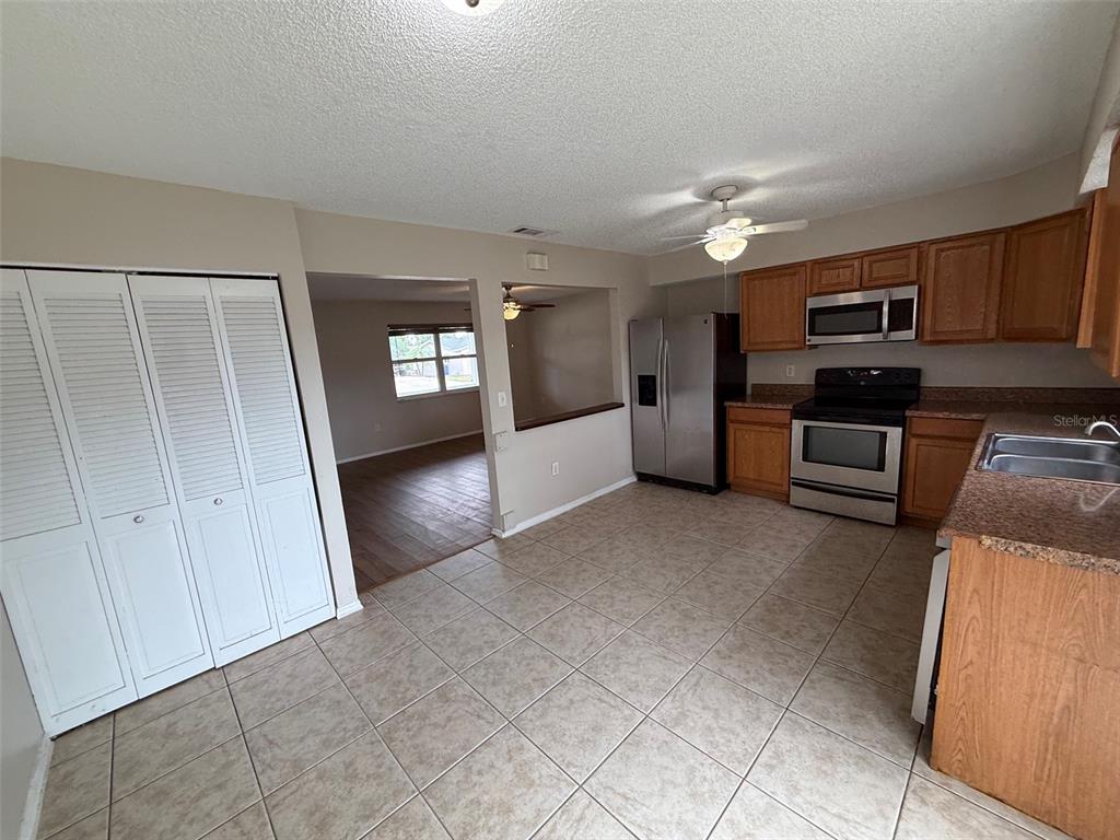 855 Jamaica Road Venice, FL 34293 - Photo 5 of 19 a view of a kitchen with a sink cabinets and a kitchen counter space