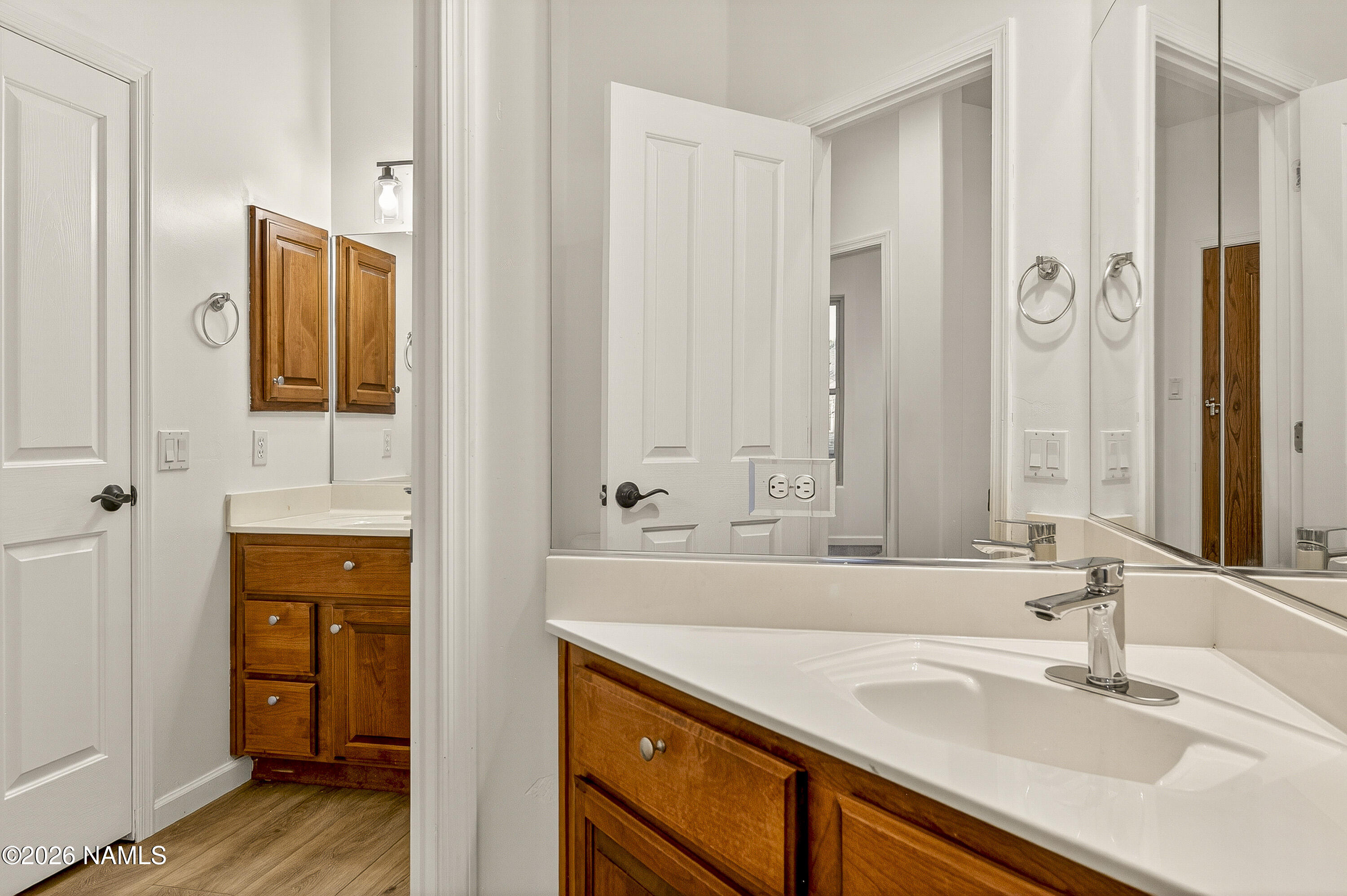 600 Brookline Loop Williams, AZ 86046 - Photo 32 of 43 a bathroom with a sink and a mirror