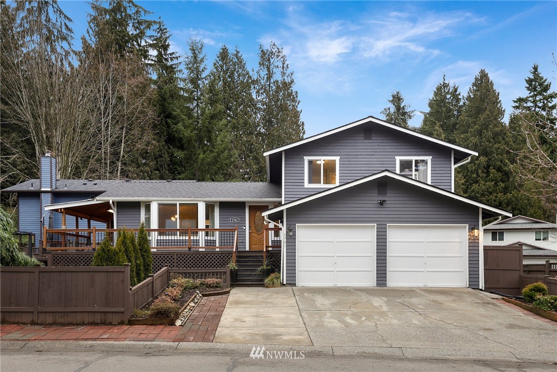 a front view of a house with yard
