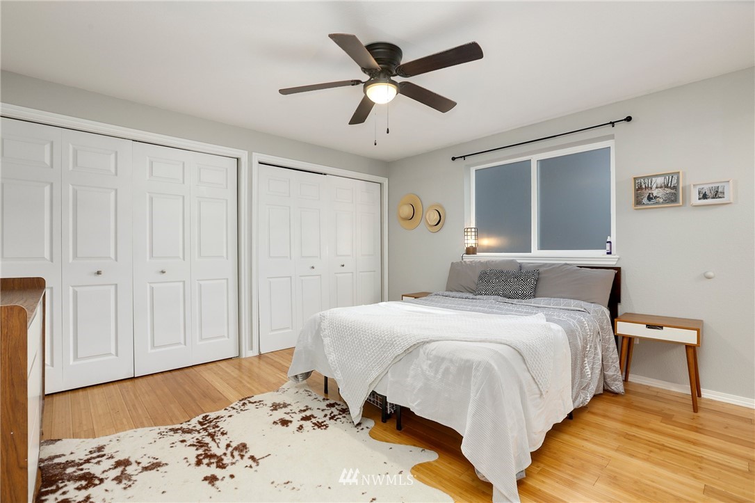 1701 174th Place Southeast Bothell, WA 98012 - Photo 18 of 40 a bedroom with a bed and a dresser
