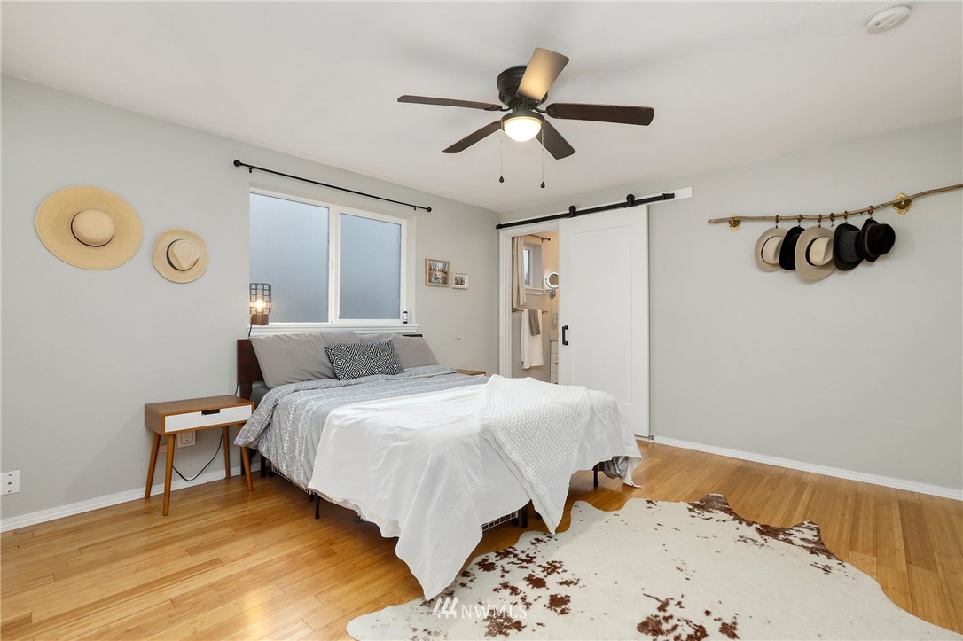 1701 174th Place Southeast Bothell, WA 98012 - Photo 20 of 40 a bedroom with a bed and dresser