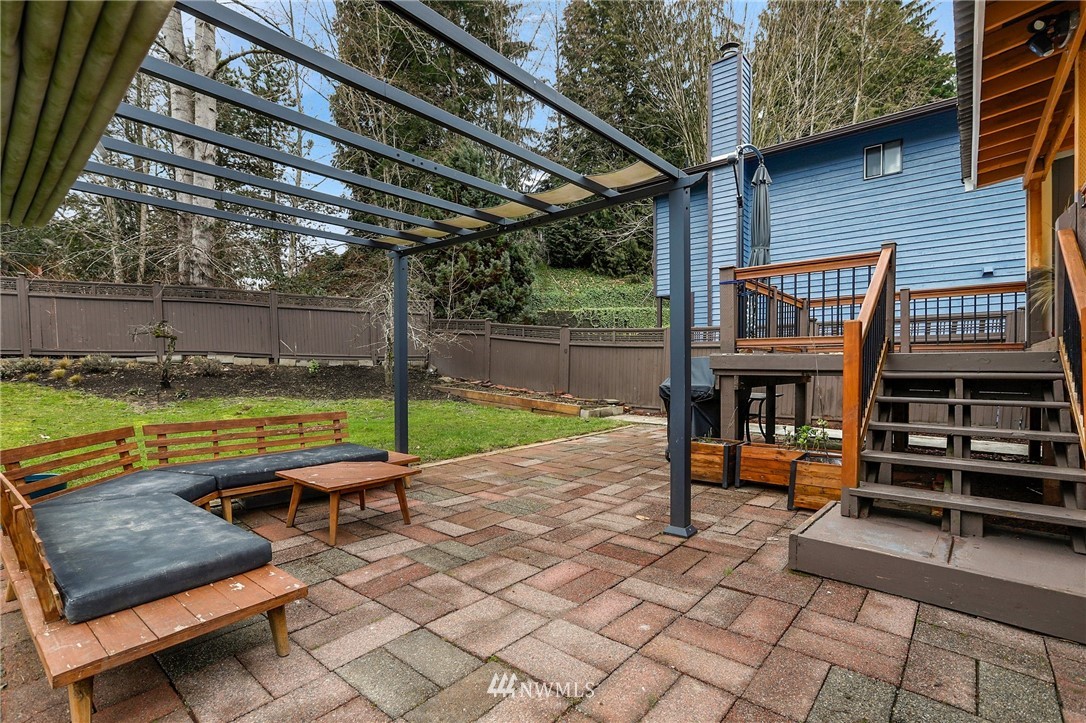 1701 174th Place Southeast Bothell, WA 98012 - Photo 30 of 40 a view of swimming pool with chairs in patio