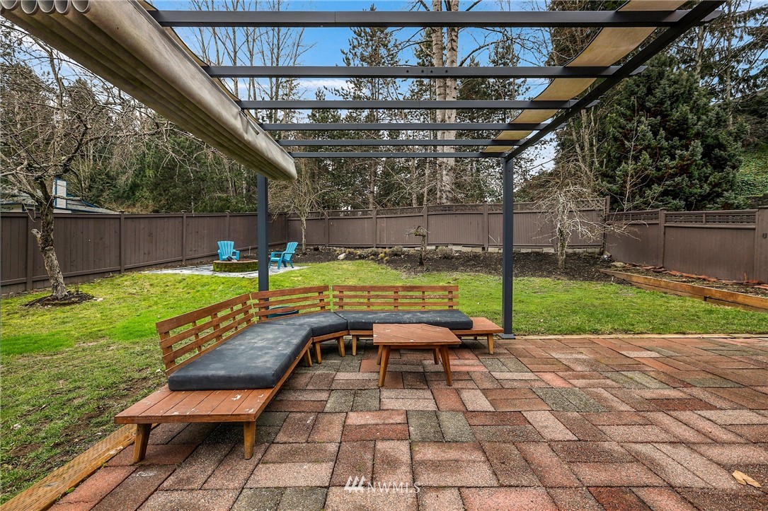1701 174th Place Southeast Bothell, WA 98012 - Photo 31 of 40 a view of swimming pool with a patio