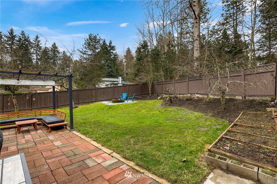 1701 174th Place Southeast Bothell, WA 98012 - Photo 32 of 40 a view of a backyard with sitting area