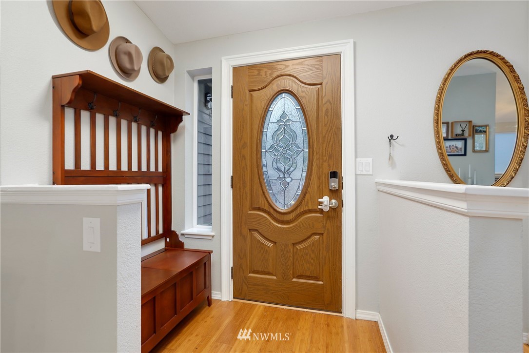1701 174th Place Southeast Bothell, WA 98012 - Photo 4 of 40 a view of a entryway door with wooden floor