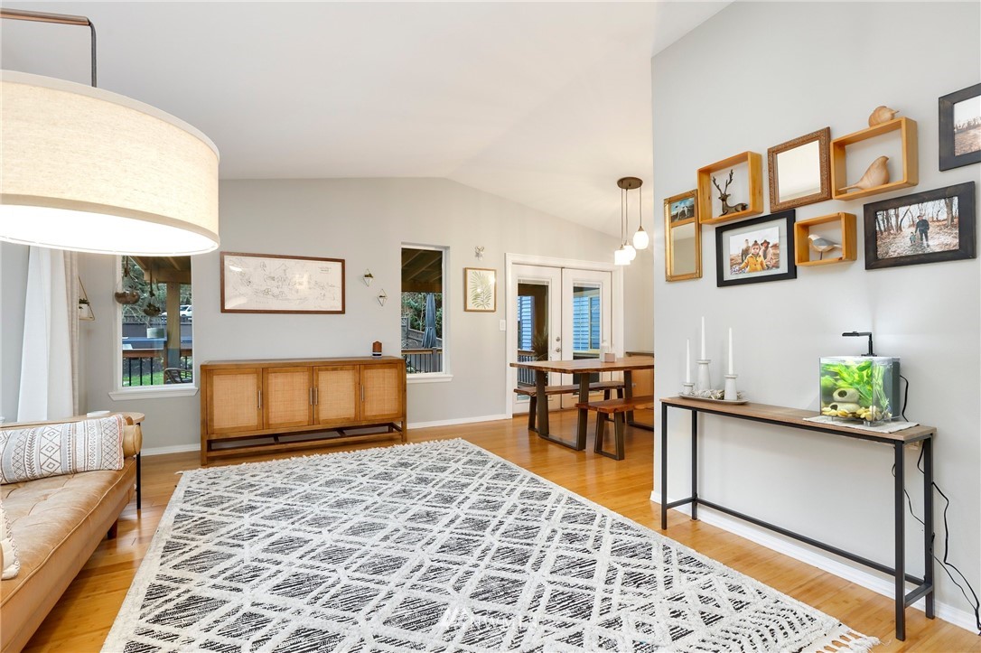 1701 174th Place Southeast Bothell, WA 98012 - Photo 5 of 40 a bedroom with furniture and a table