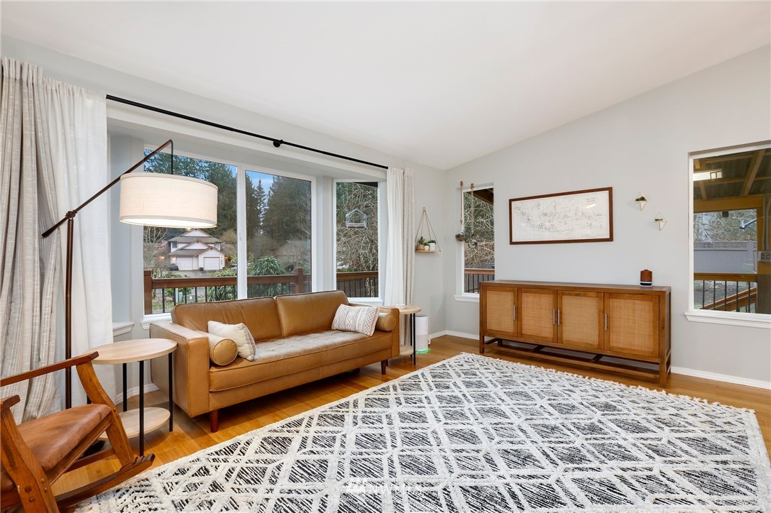 1701 174th Place Southeast Bothell, WA 98012 - Photo 6 of 40 a living room with furniture and a rug