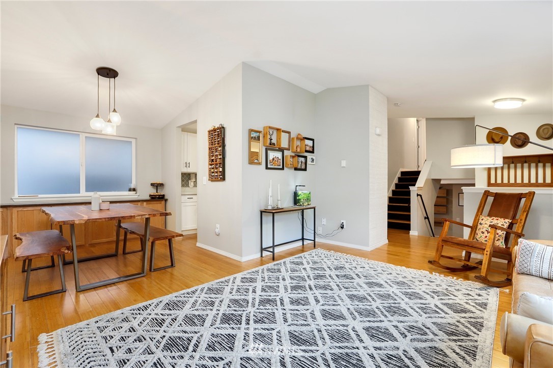 1701 174th Place Southeast Bothell, WA 98012 - Photo 7 of 40 a living room with furniture rug and wooden floor