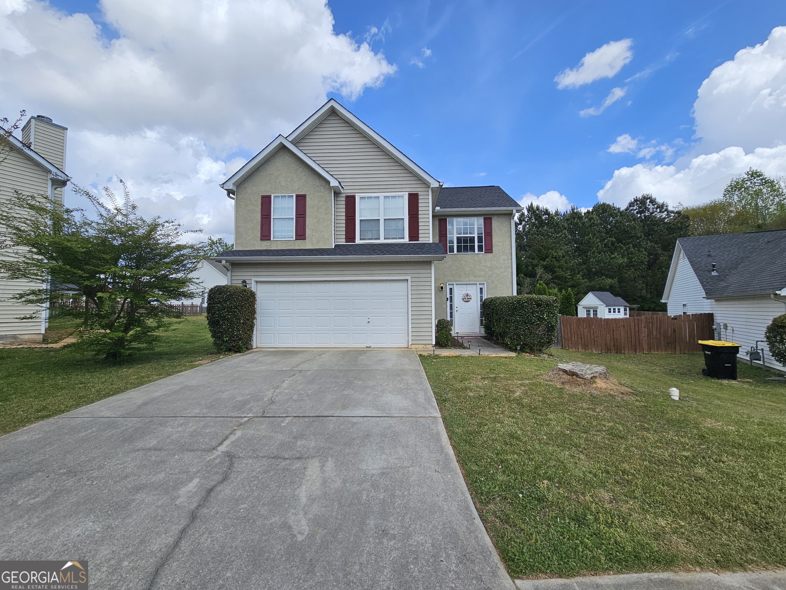 5077 Meadow Trace Fairburn, GA 30213 - Photo 2 of 43 a view of house and outdoor space