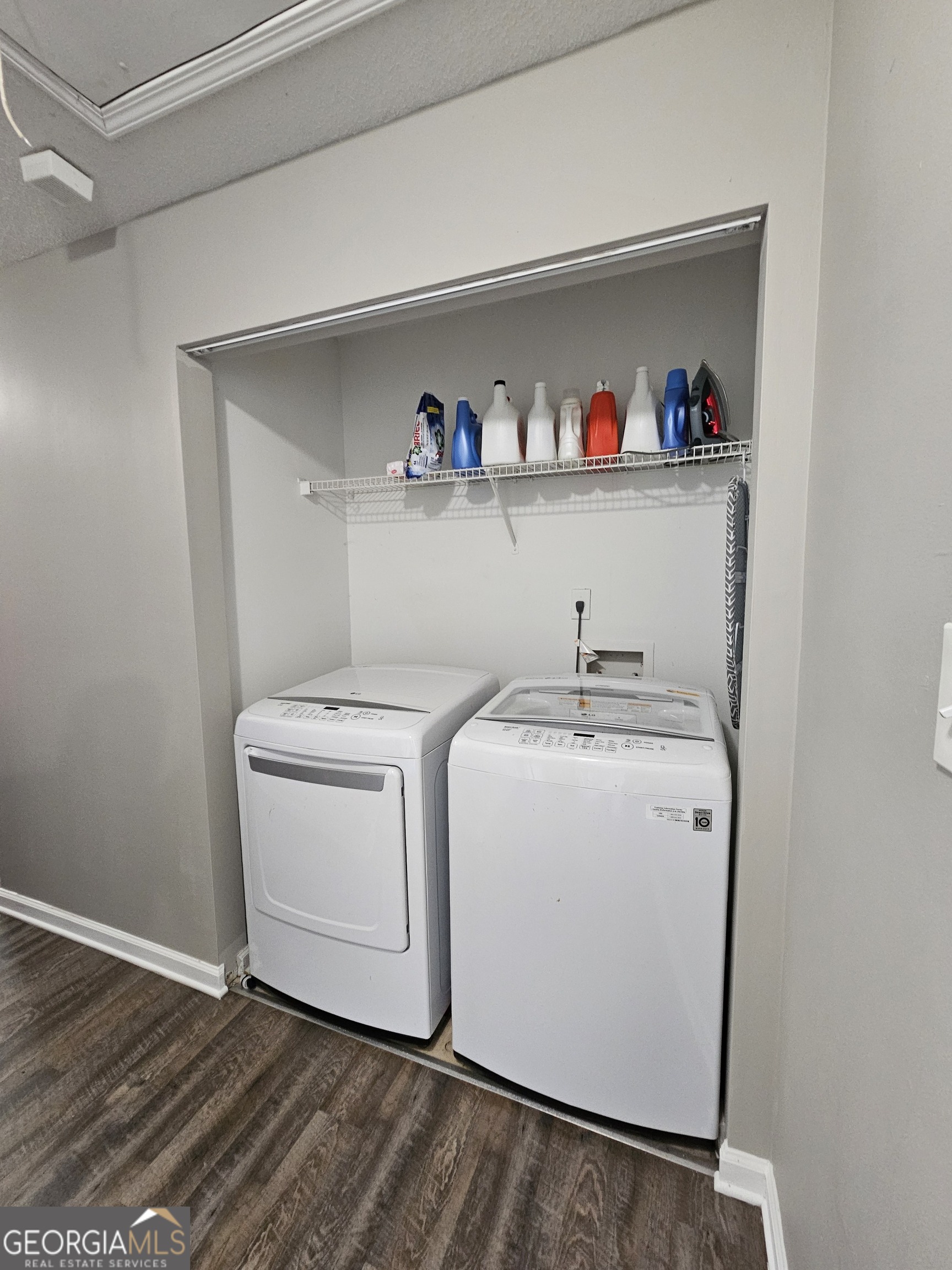 5077 Meadow Trace Fairburn, GA 30213 - Photo 43 of 43 a utility room with dryer and washer