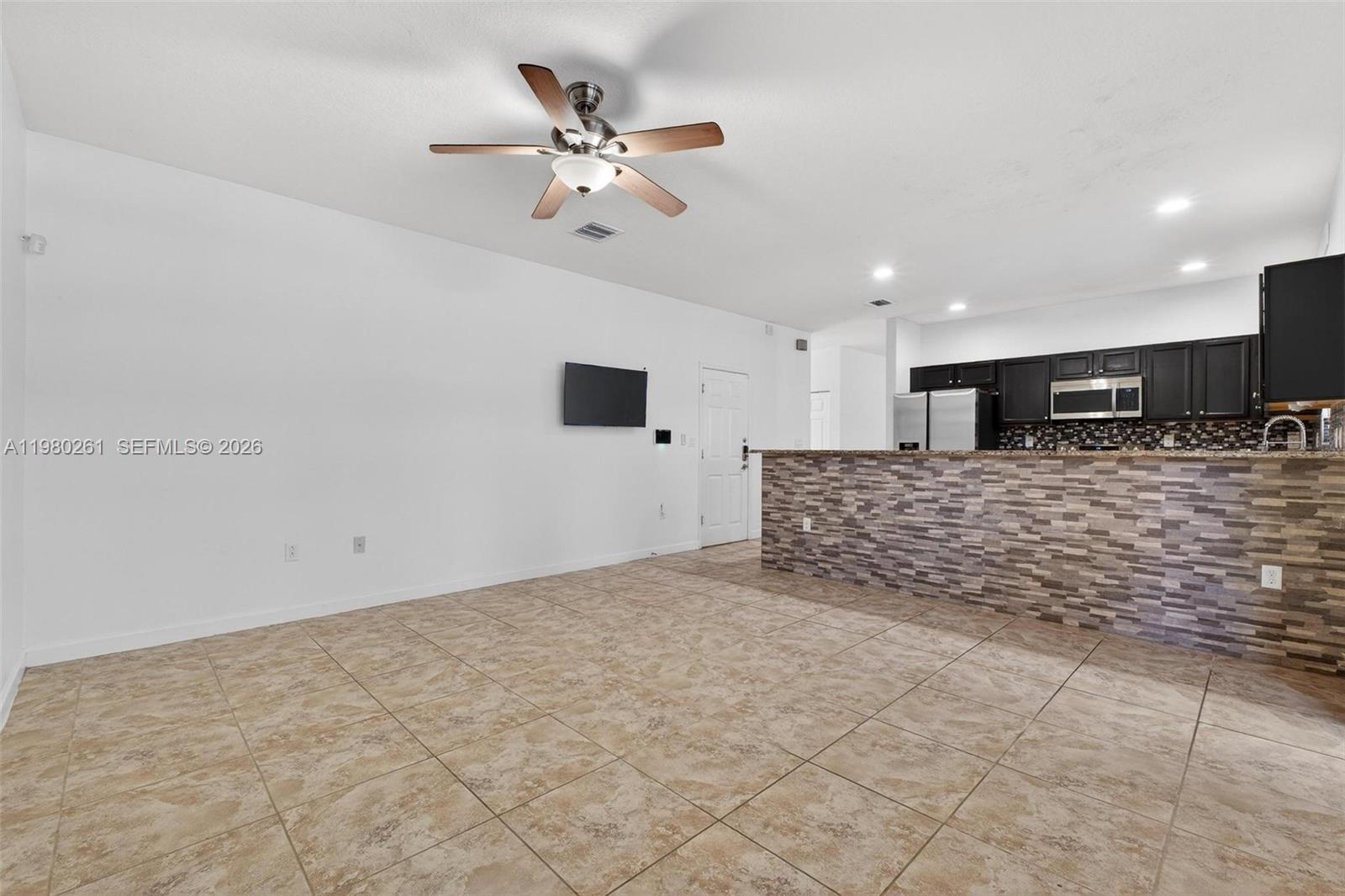 11561 Southwest 232nd Lane Homestead, FL 33032 - Photo 20 of 60 a view of a livingroom with furniture