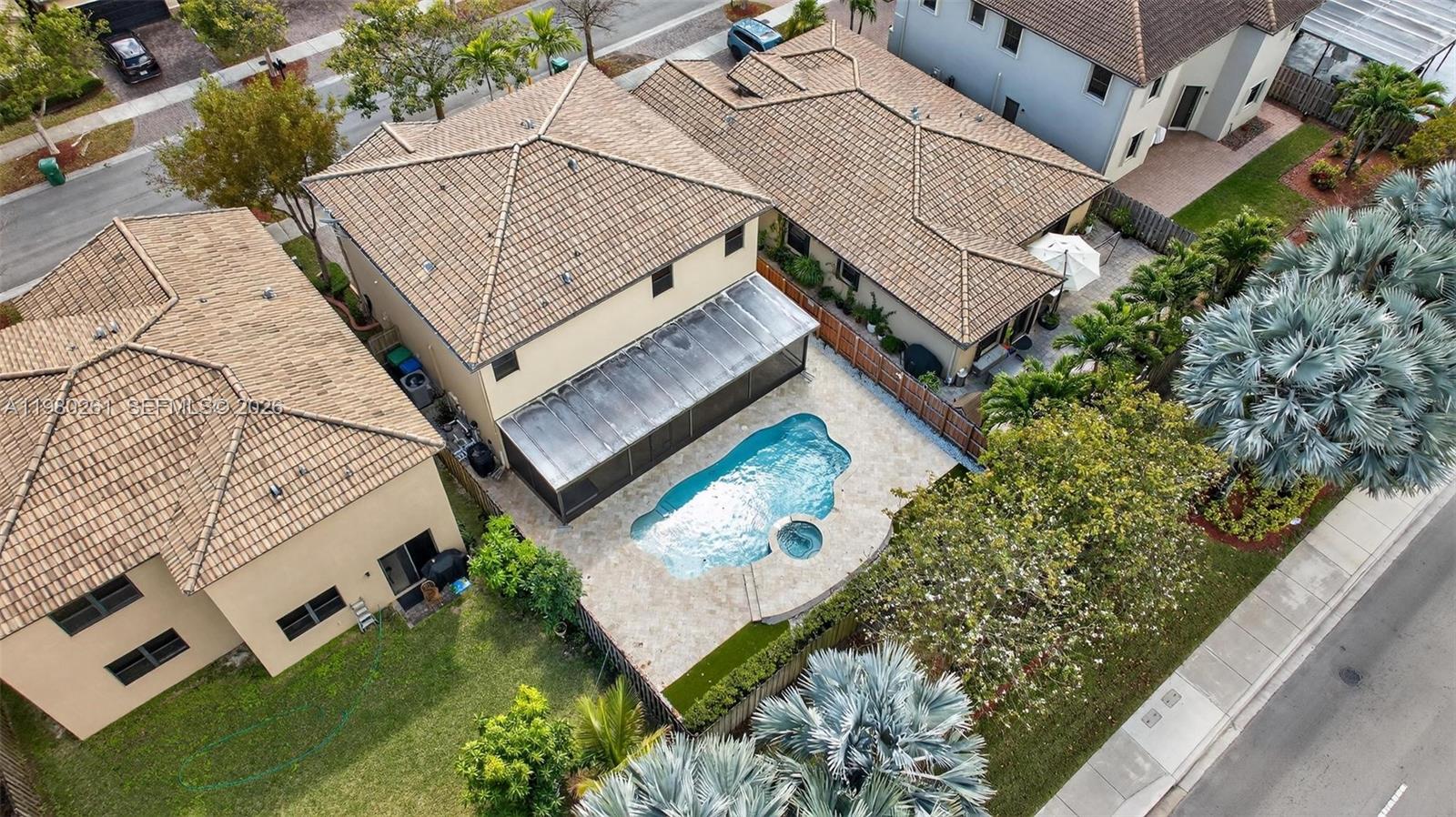 11561 Southwest 232nd Lane Homestead, FL 33032 - Photo 58 of 60 an aerial view of a house