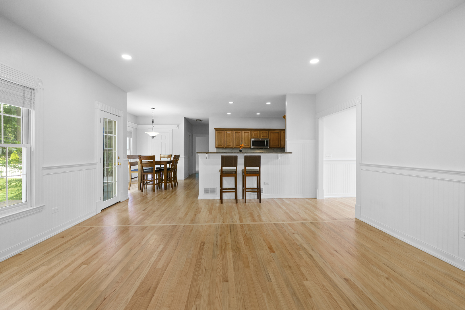 662 Waterbury Avenue Gurnee, IL 60031 - Photo 13 of 51 a view of kitchen with cabinets and wooden floor