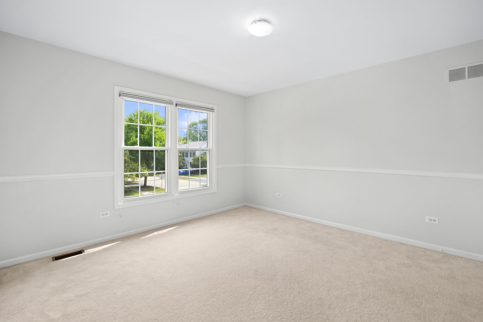 662 Waterbury Avenue Gurnee, IL 60031 - Photo 27 of 51 an empty room with a window