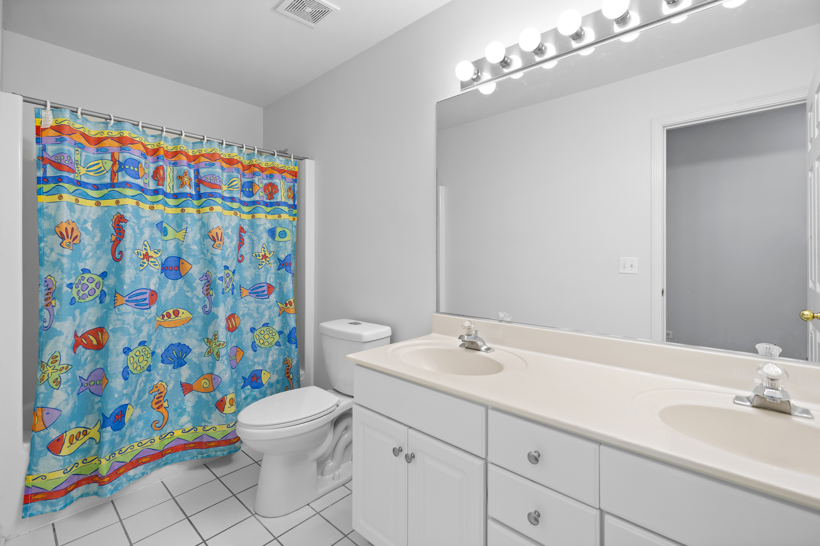 662 Waterbury Avenue Gurnee, IL 60031 - Photo 33 of 51 a bathroom with a sink mirror vanity and toilet