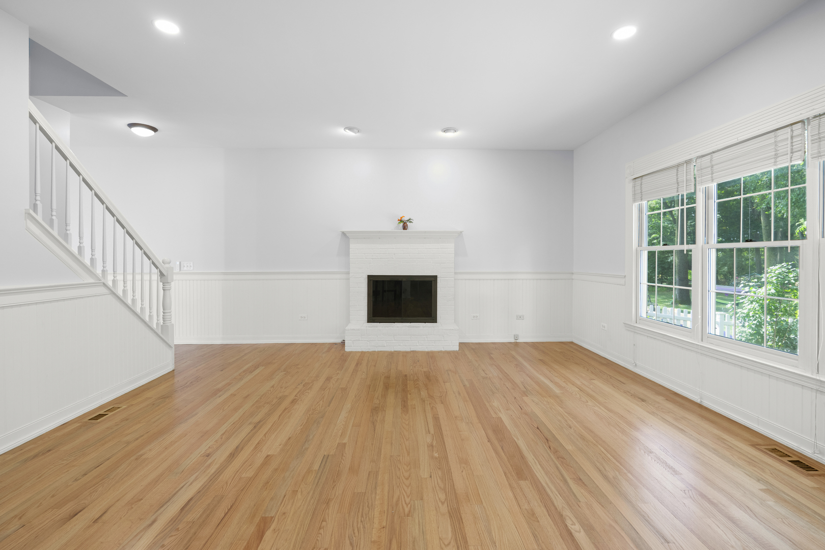 662 Waterbury Avenue Gurnee, IL 60031 - Photo 10 of 51 a view of empty room with wooden floor and fan