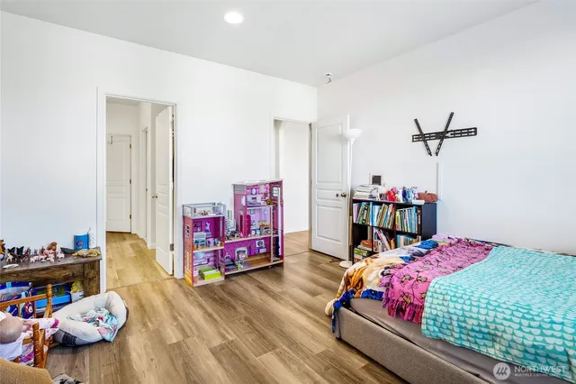 a bathroom with a double vanity sink and mirror