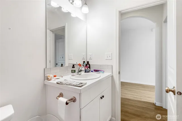 a bedroom with a bed and a book shelf