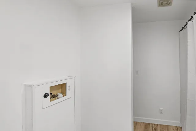 a bathroom with a sink and mirror