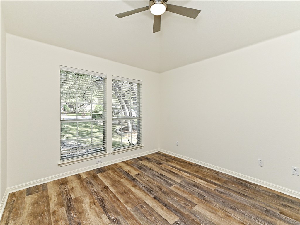 7909 Cobblestone Austin, TX 78735 - Photo 9 of 12 an empty room with a window