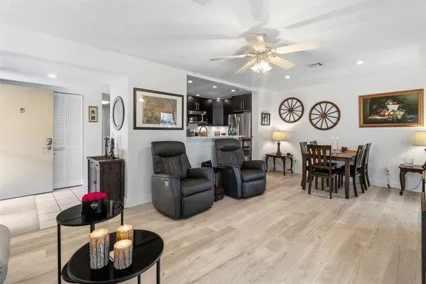 a living room with furniture and a table