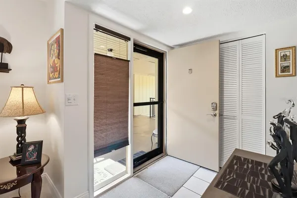 a view of a bedroom with bathroom