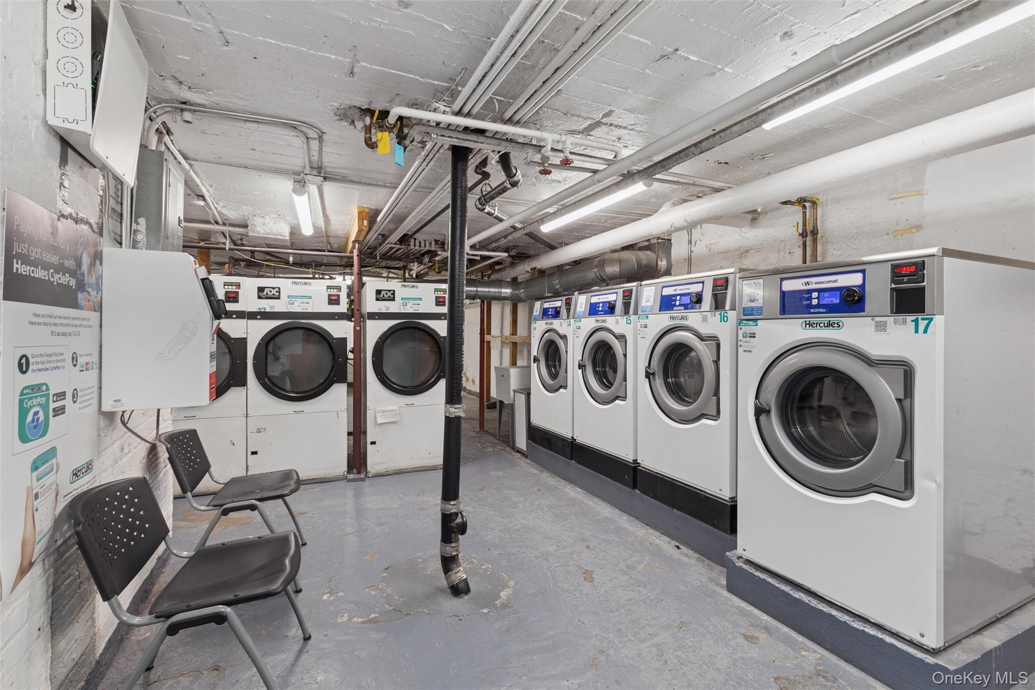 83-74 Talbot Street, Unit 6F Queens, NY 11415 - Photo 11 of 13 a utility room with dryer and washer
