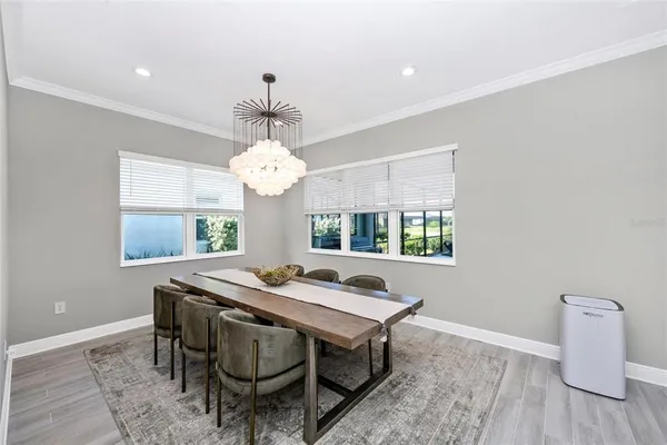 a bathroom with a sink a large mirror and shower