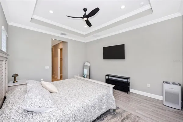 a view of a patio with furniture and a grill