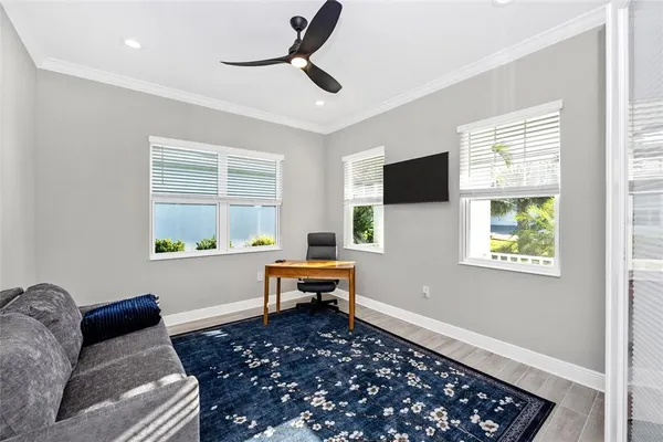 a living room with furniture and a window