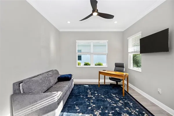 a living room with furniture and a window