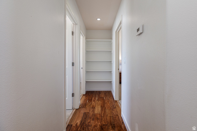 6 300th Road North, Unit I6 Kanab, UT 84741 - Photo 19 of 37 Hall with dark wood-style floors, a textured wall, and recessed lighting