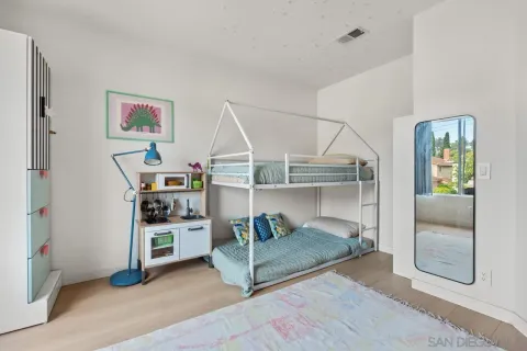 a workspace with furniture and wooden floor