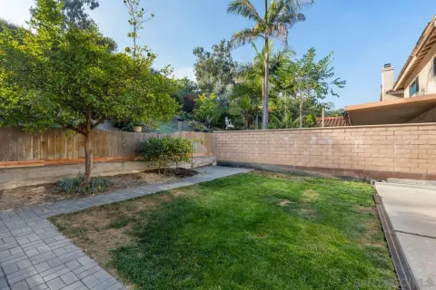 an aerial view of residential house with outdoor space