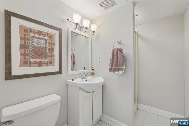 a view of a backyard with sitting area and garden