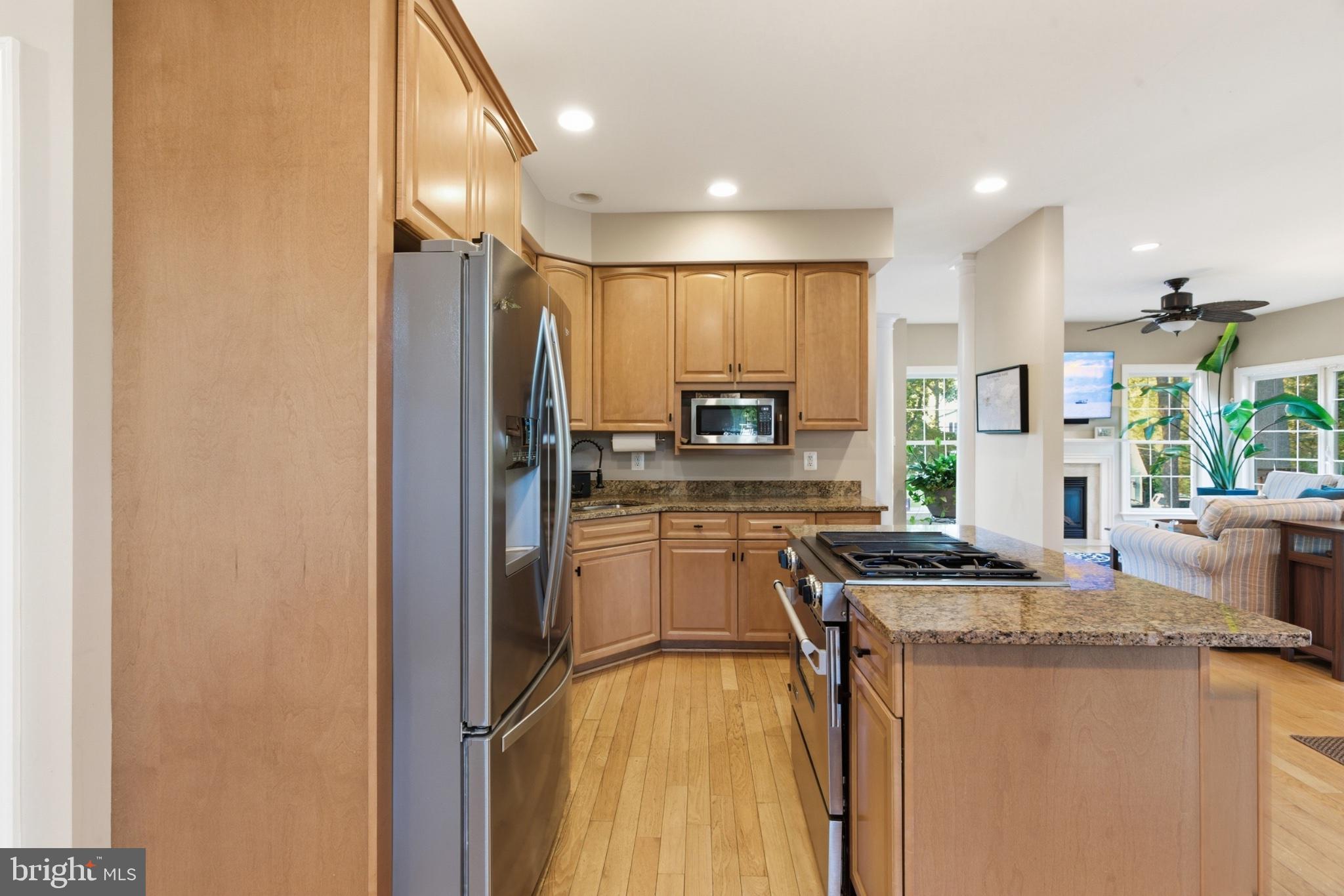 1219 Meadow View Road Pasadena, MD 21122 - Photo 16 of 70 Modern kitchen with warm wood tones.